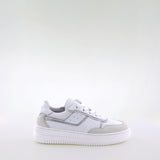 Girl's white leather sneakers by Giga Shoes.