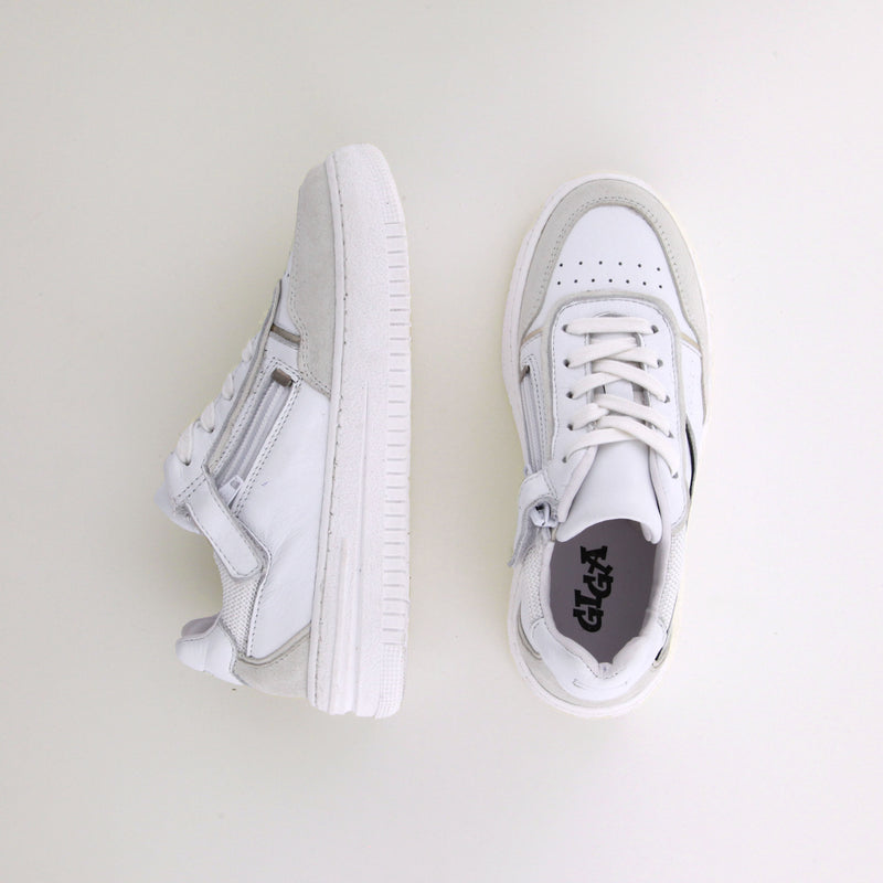 Girl's white leather sneakers by Giga Shoes.