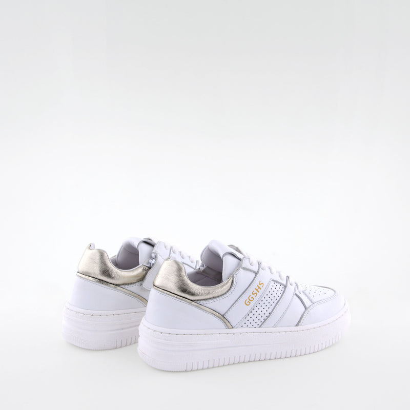 Girl's white leather sneakers by Giga Shoes.