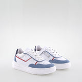 Boy's white and blue leather sneakers by Giga Shoes.