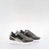 Girl's black suede sneakers by Giga Shoes.